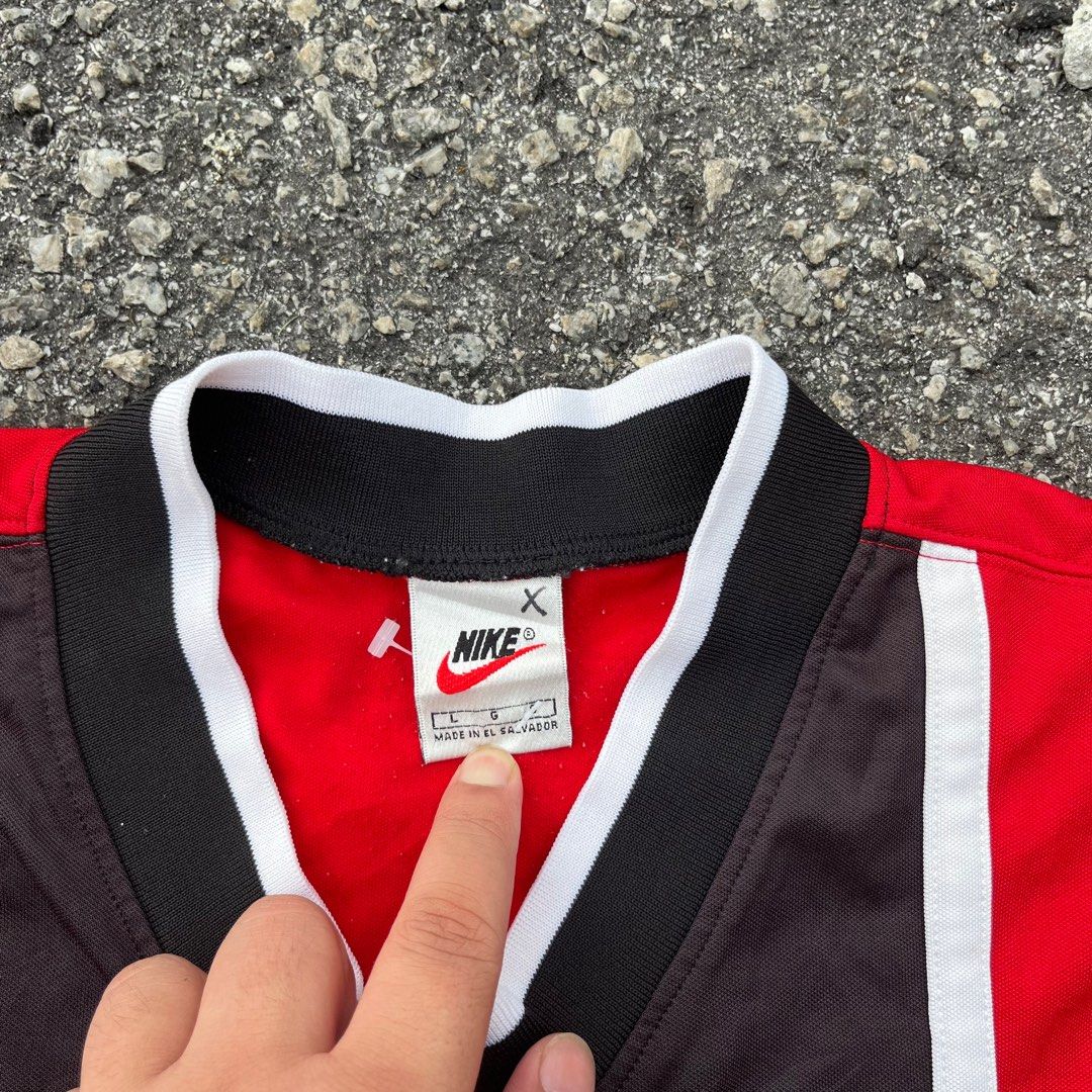 Nike white tag red swoosh hotsell