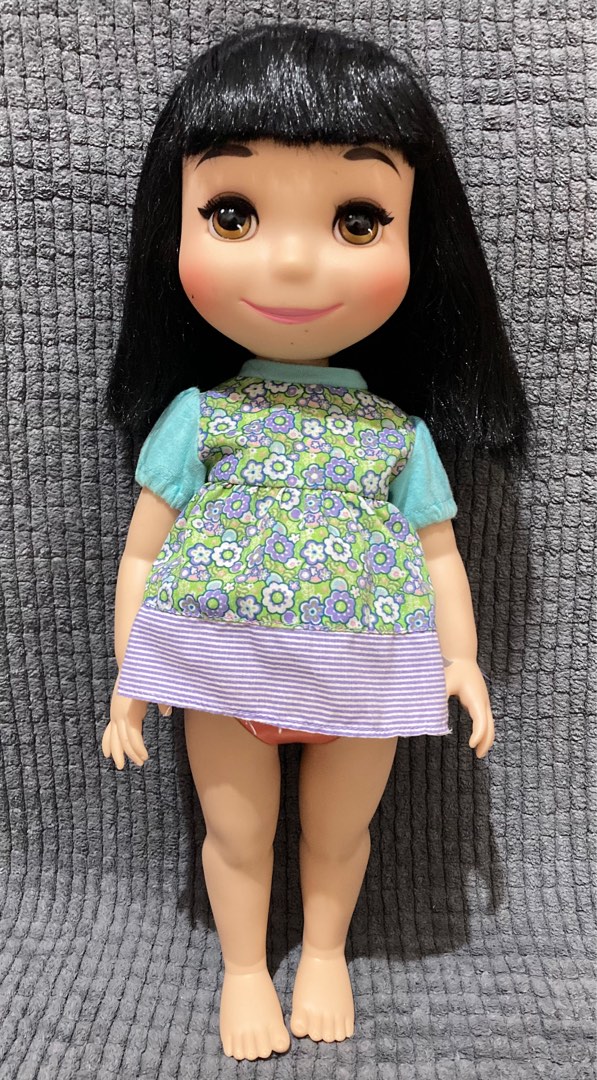 Disney animator it's a small world 15" singing doll on Carousell