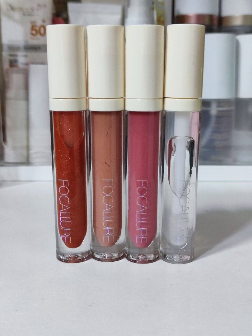 BUNDLE Focallure lip gloss (Category: Makeup) located in Makati City. Submitted by declutteringyk (Listing ID 1250854822, Image 1). Description: swatched once only.