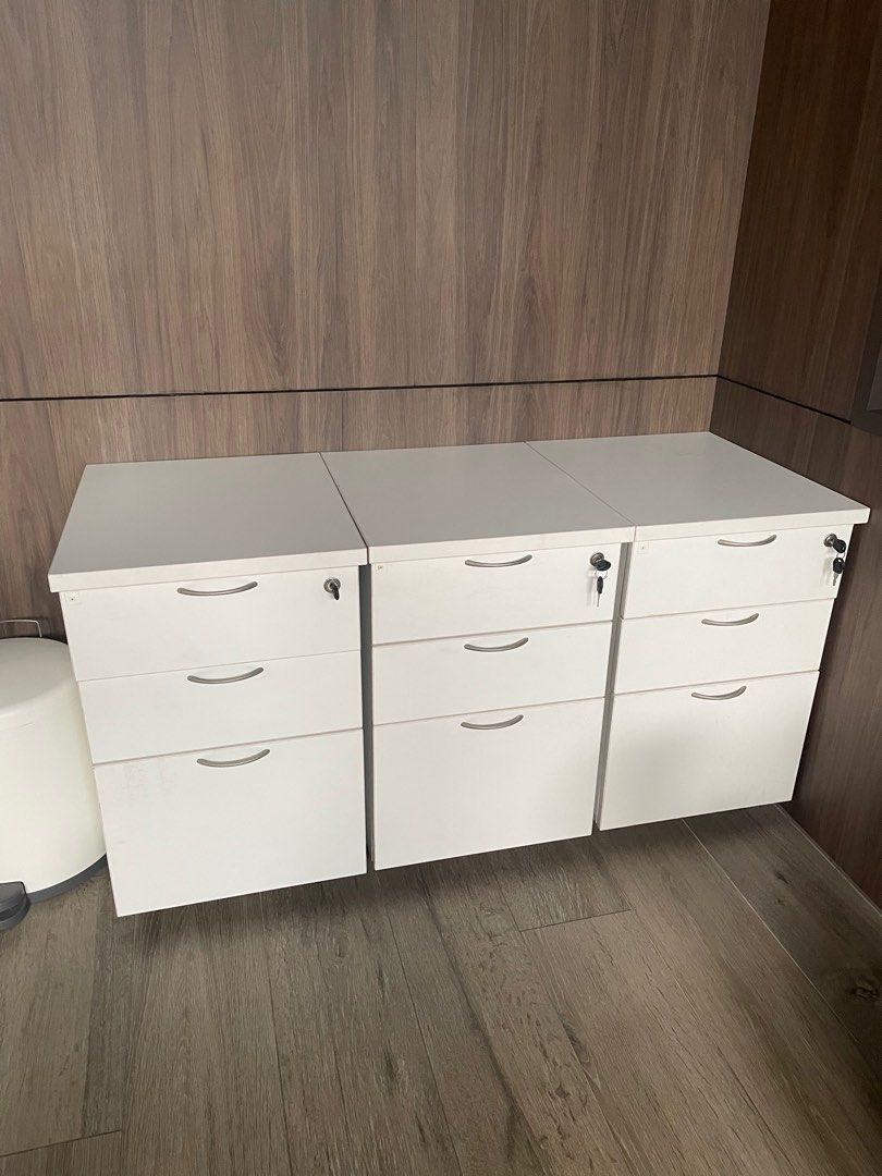 IKEA white Pedestals drawers with movable dollar wheels and lock and