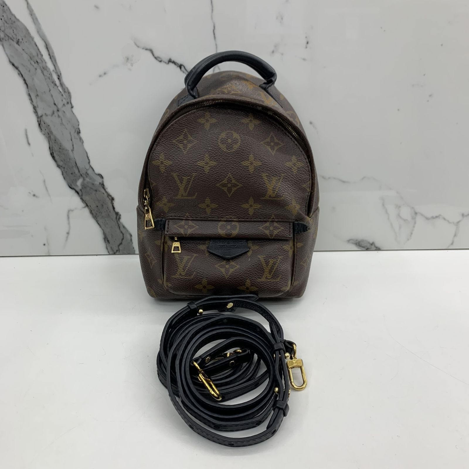 louis vuitton backpack resale