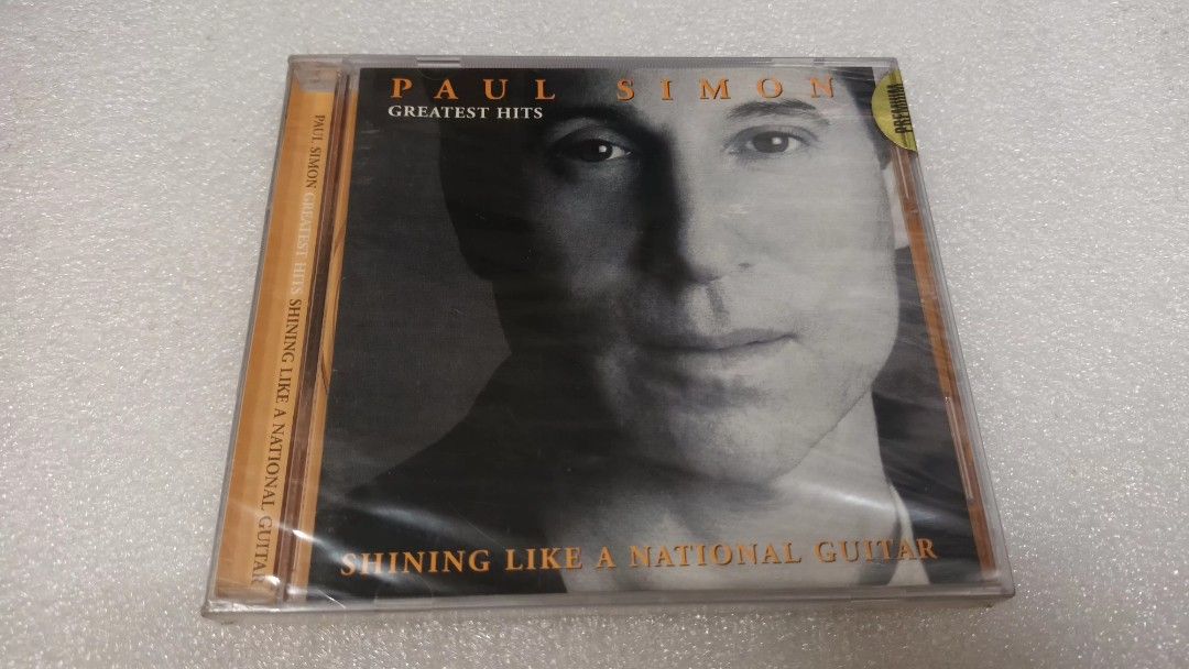 Paul Simon – Greatest Hits: Shining Like A National Guitar