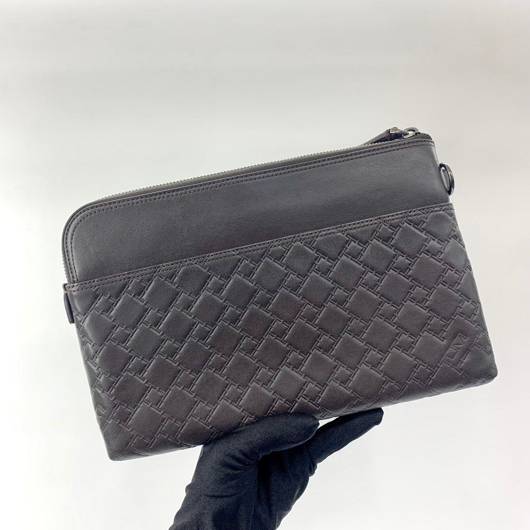 Tumi men's clutch 2025 bag