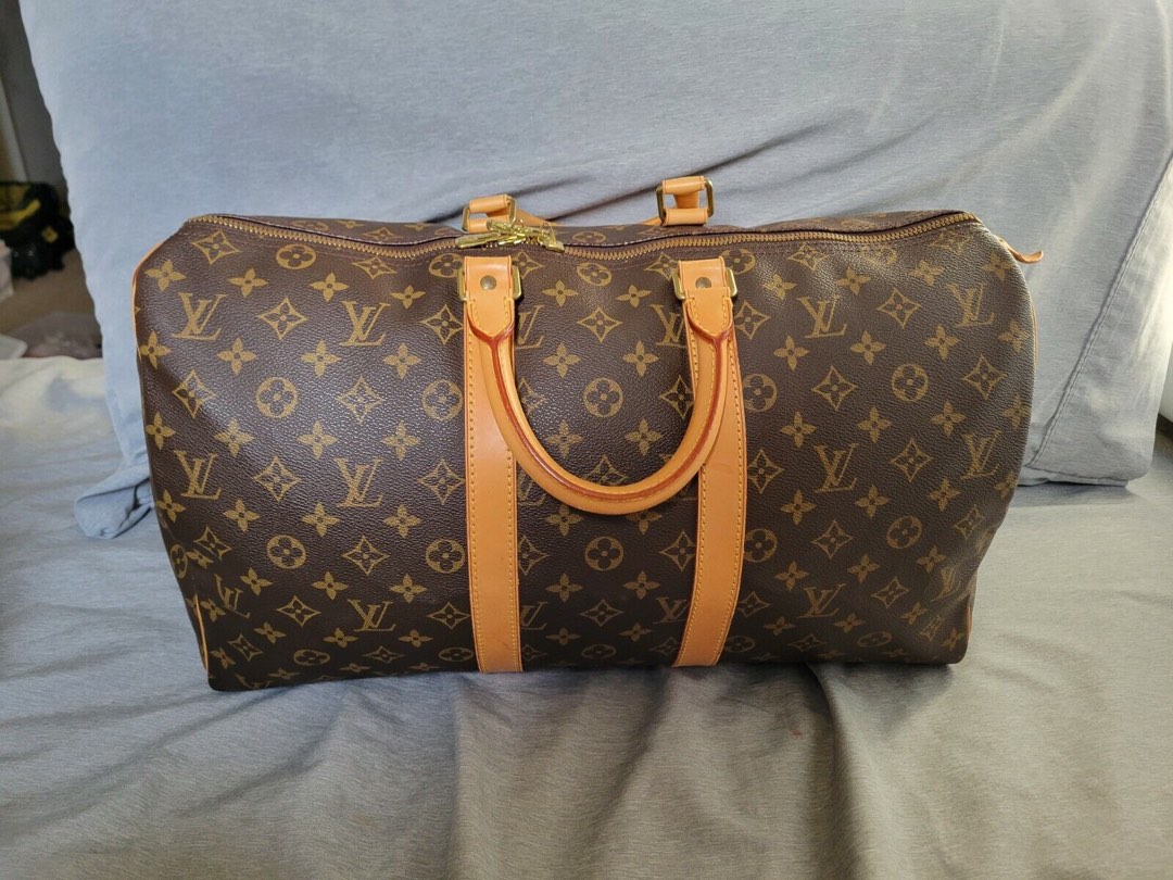 Louis Vuitton Keepall 55 Duffle Epi Weekender Bag - Farfetch