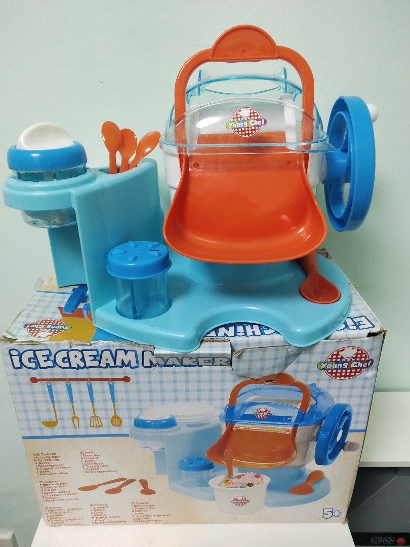 Young chef ice shop cream maker