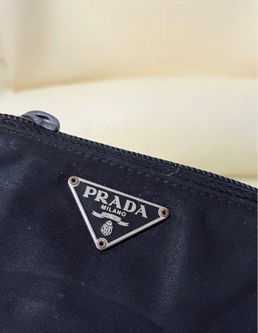 100% Authentic Prada Nylon Key Holder (Category: Luxury Bags & Wallets) located in Antipolo. Submitted by kiksy.closet (Listing ID 1251066287, Image 2). Description: Authentic Prada Nylon Key Holder - Guaranteed authentic! Money back guaranteed. Pls see details of the key holder. I bought this in Japan in 2019, and used it as a cardholder and a key holder. - Condition: 8/10. It has a few foldings on the nylon material; there is one missing key ho