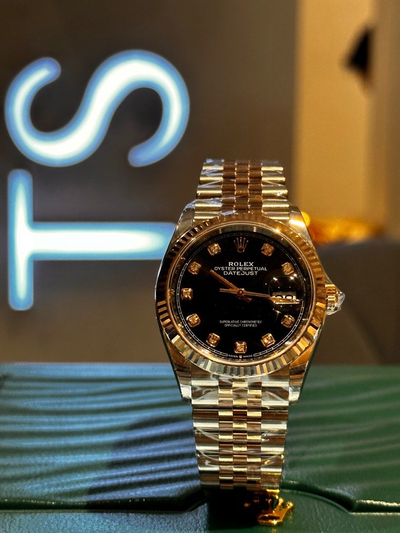 Rolex oyster perpetual datejust black hotsell face with diamonds