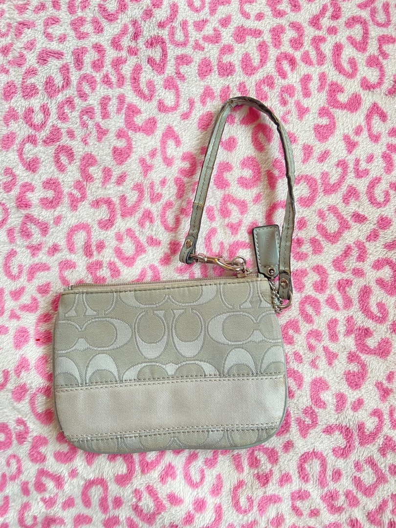 Coach wristlet, Women's Fashion, Bags & Wallets, Clutches on Carousell