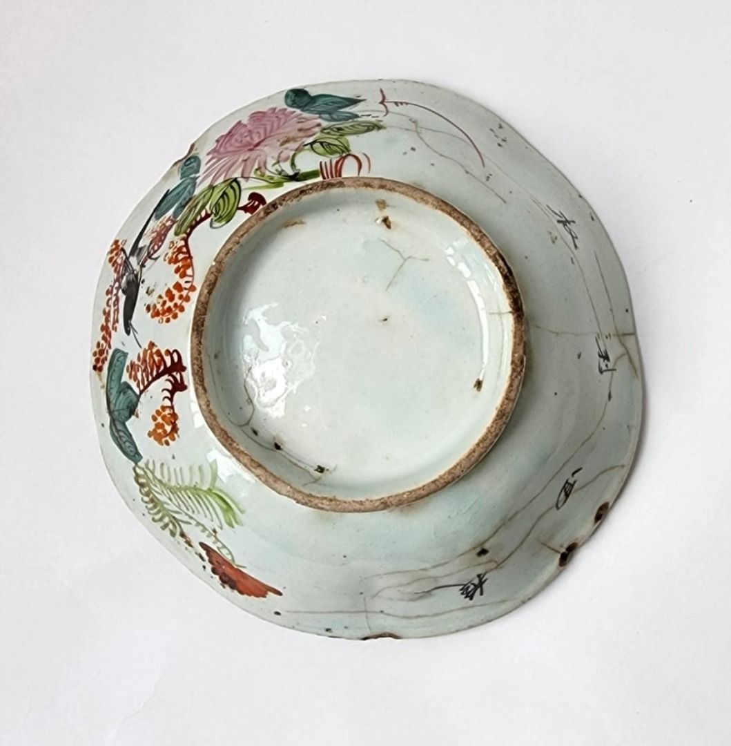 Colourful old Chinese rice bowl with bird perching in the midst of ...
