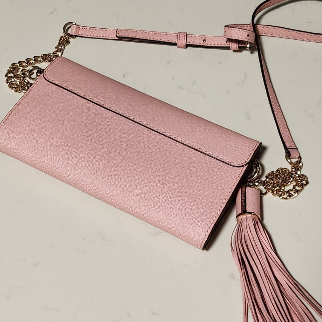 Baby pink michael kors wallet deals