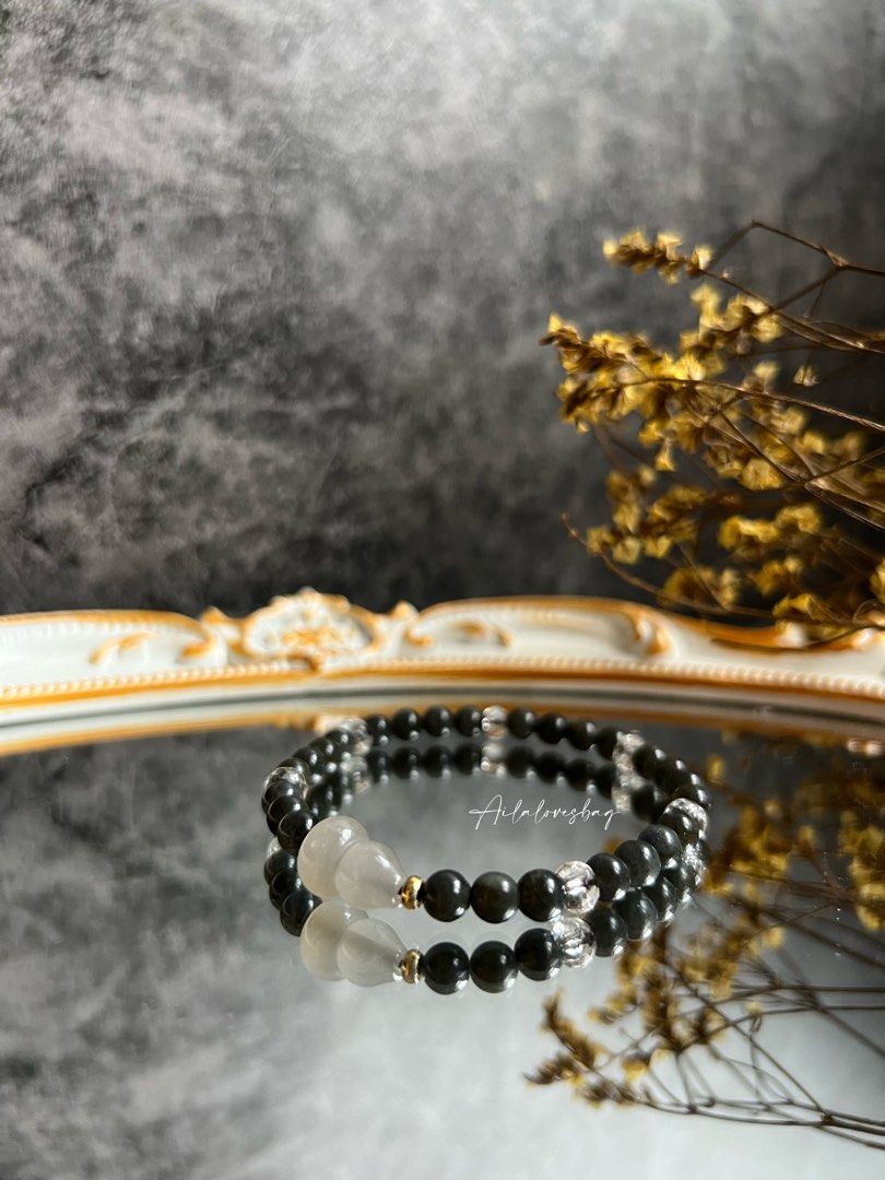 Clear bracelet with sales black and white bead