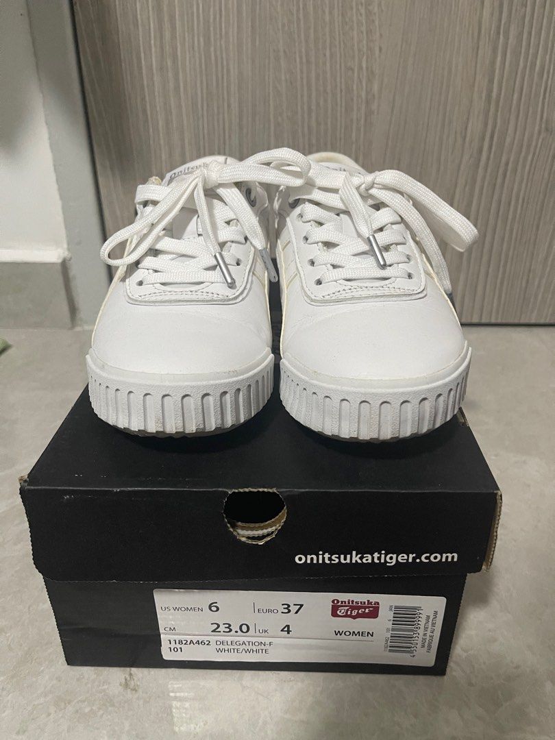 Onitsuka Tiger (Category: Sneakers) located in Singapore. Submitted by miky809 (Listing ID 1251049996, Image 2). Description: 100% Authentic. Full white colour (Size 36, True to the size) One side of flag broken. Worn less than 10 times. 85% look new.