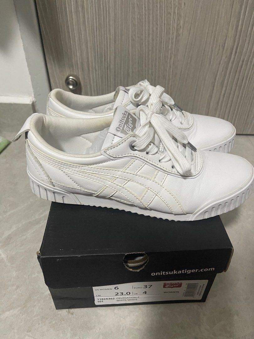 Onitsuka Tiger (Category: Sneakers) located in Singapore. Submitted by miky809 (Listing ID 1251049996, Image 1). Description: 100% Authentic. Full white colour (Size 36, True to the size) One side of flag broken. Worn less than 10 times. 85% look new.