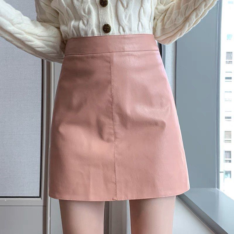Pink a-line leather skirt top
