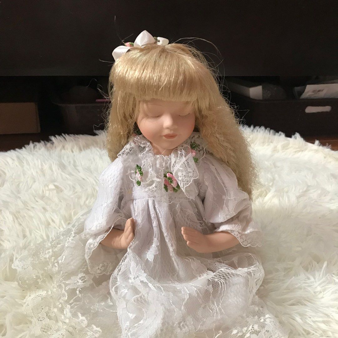 Praying porcelain doll hot sale