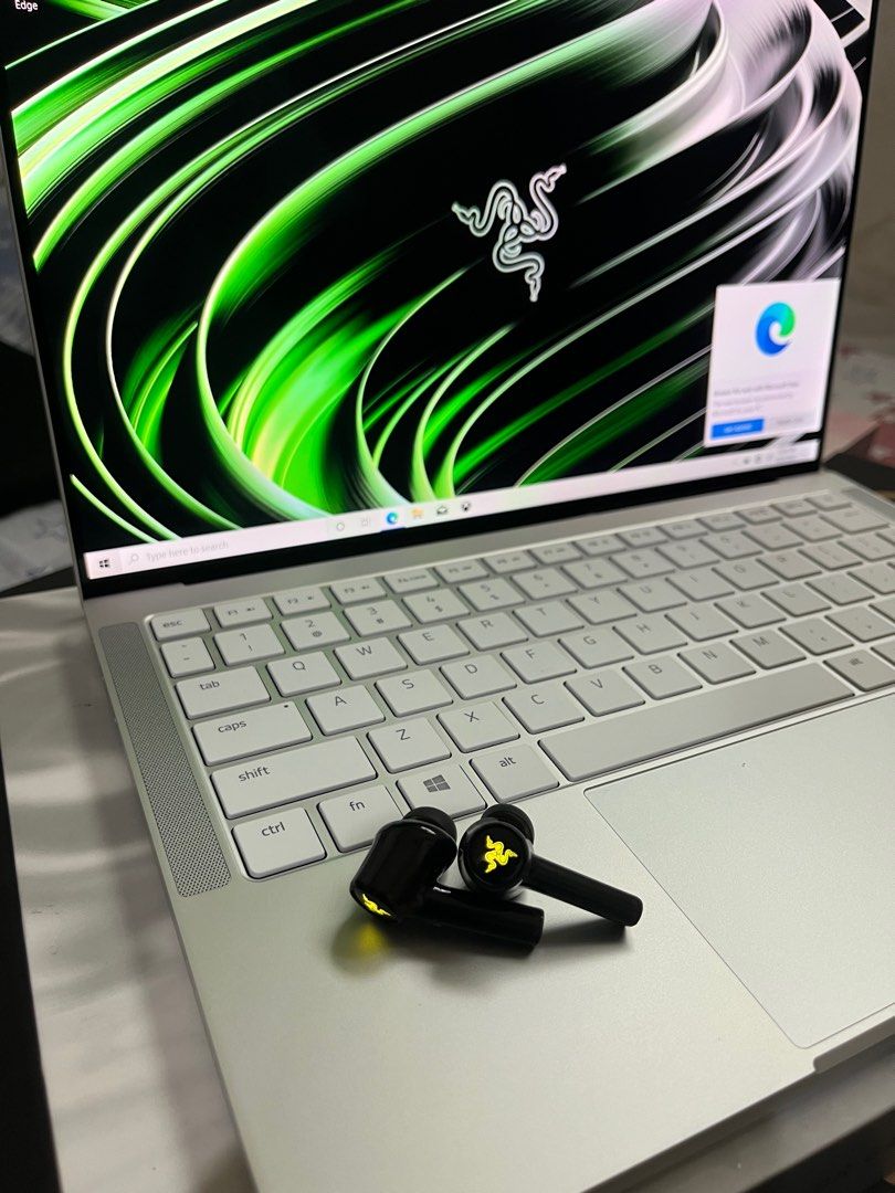 Razerbook gaming laptop (Category: Laptops & Notebooks) located in Makati City. Submitted by luisbiton (Listing ID 1250984392, Image 3). Description: Razerbook 13 i5/i7 11th gen 1165G7 Intel Iris XE 16gb ram 256gb ssd nvme m2 4k touchscreen OLED Vibrant 16:10 display Per-key RGB keyboard Ports: two USB-C Thunderbolt 4, one USB-A 3.2 Gen 1, one HDMI 2.0, one microSD slot Camera: 720p IR webcam Weight: 3.09 pounds (1.40kg) RFS: upgrade Super slight
