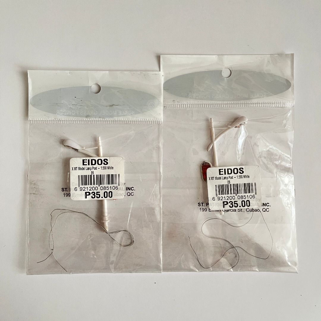 1:200 Scale Model White Plastic Lamp Post [diorama miniature] (Category: Lighting) located in Makati City. Submitted by piabubots (Listing ID 1251231501, Image 3). Description: 𝗗𝗲𝘀𝗰𝗿𝗶𝗽𝘁𝗶𝗼𝗻 ✦ bought from Eidos for ₱35 each ✷ actually lights up when wired ✦ supposed to be used for a scale model project 𝗖𝗼𝗻𝗱𝗶𝘁𝗶𝗼𝗻 ✷ excellent quality (4 out of 4) ✦ unopened & unused 𝗠𝗲𝗮𝘀𝘂𝗿𝗲𝗺𝗲𝗻𝘁𝘀 ✷ Length - 2.25 cm ✦ Height - 6 cm.