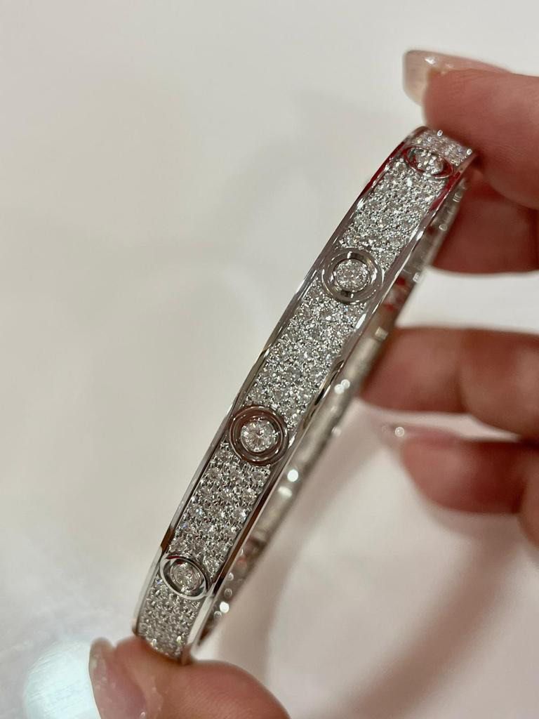 White gold screw best sale bangle