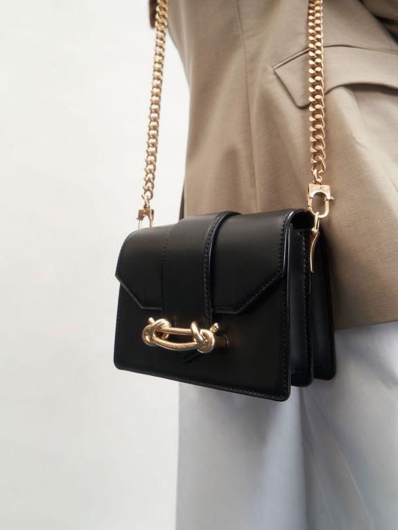 Sela snake cheap cross body bag
