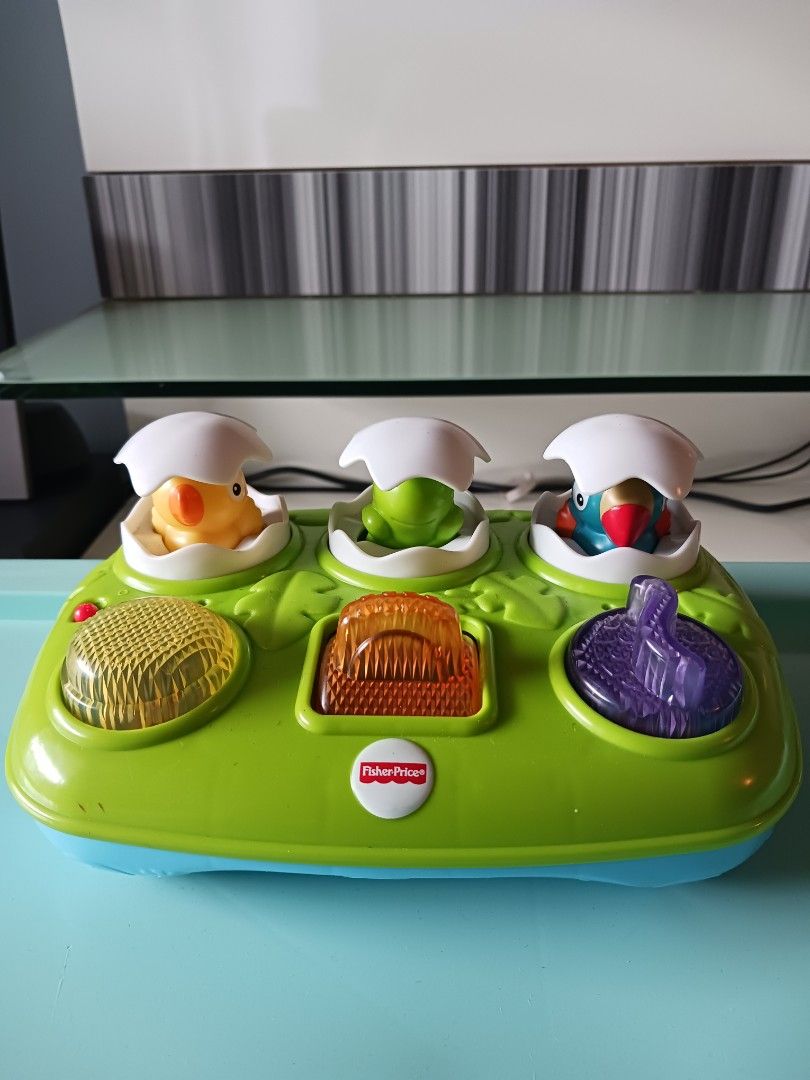 Fisher price musical sale pop up eggs
