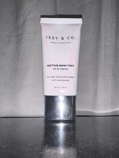 issy and co tinted sunscreen in spruce