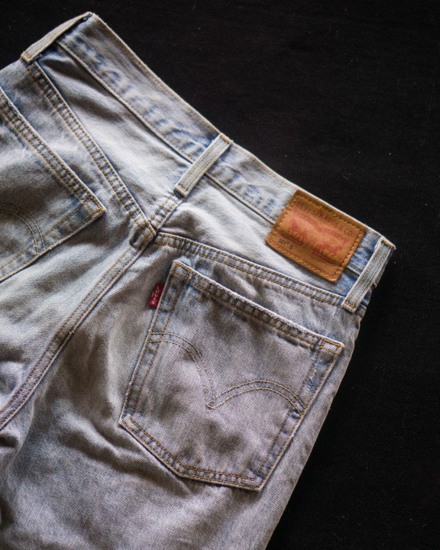 501 skinny light store blue distressed jeans