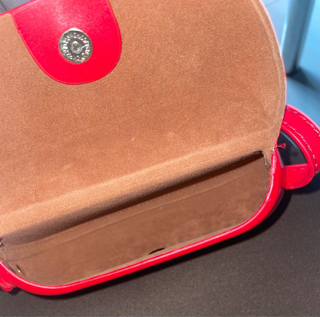 Red mini crossbody shoulder leather sling bag (Category: Shoulder Bags) located in Paranaque City. Submitted by shopowned (Listing ID 1251161518, Image 2). Description: barely used bought for 300 rfs: too small for me slightly negotiable added a small hole on the strap bc i wanted to make it a shoulder bag but it’s barely noticeable (last 2 pics) MOP GCASH MOD LALAMOVE OR GGX.