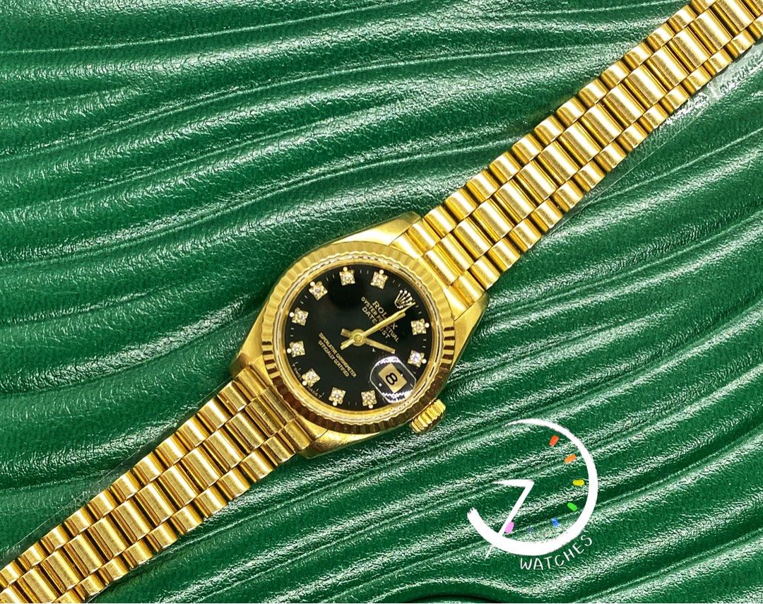 Rolex Oyster Perpetual Datejust 26 69178 full gold black dial diamonds