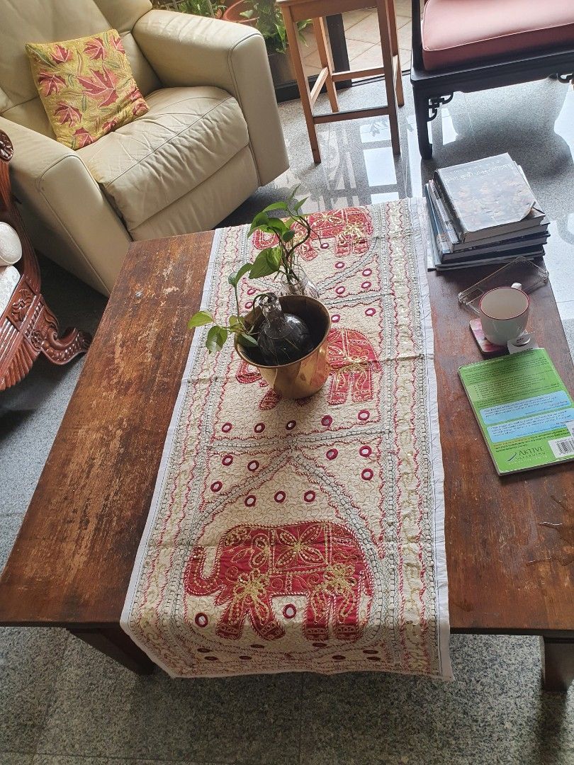 Table Runner (Category: Carpets & Mats) located in Singapore. Submitted by pansy_flower (Listing ID 1171265651, Image 3). Description: Pure cotton table runner with heavily embroidered motifs. Perfect for hosting guests' at home and festivals. Length...149 cms, Breadth ...50 cms.