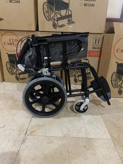 "*(Travel wheelchair)"*