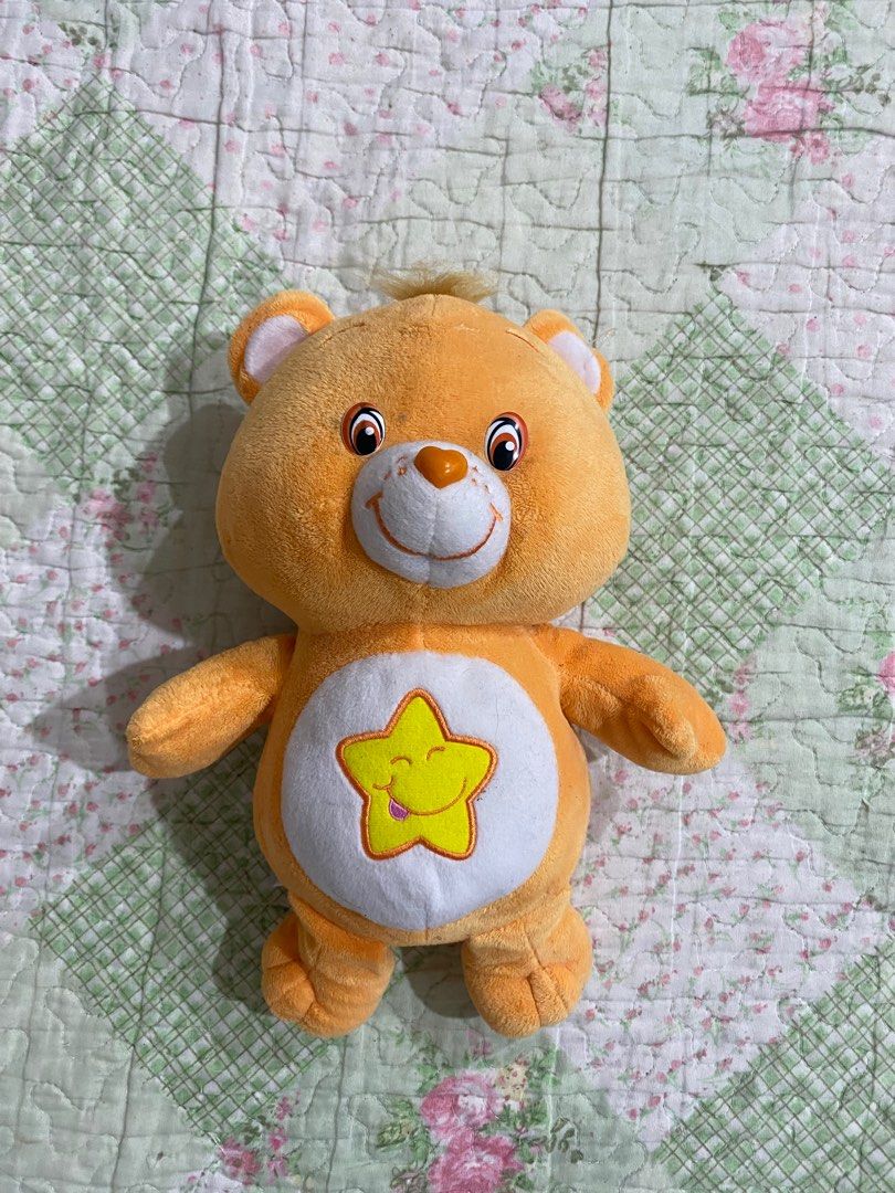 Orange care bear with outlet star