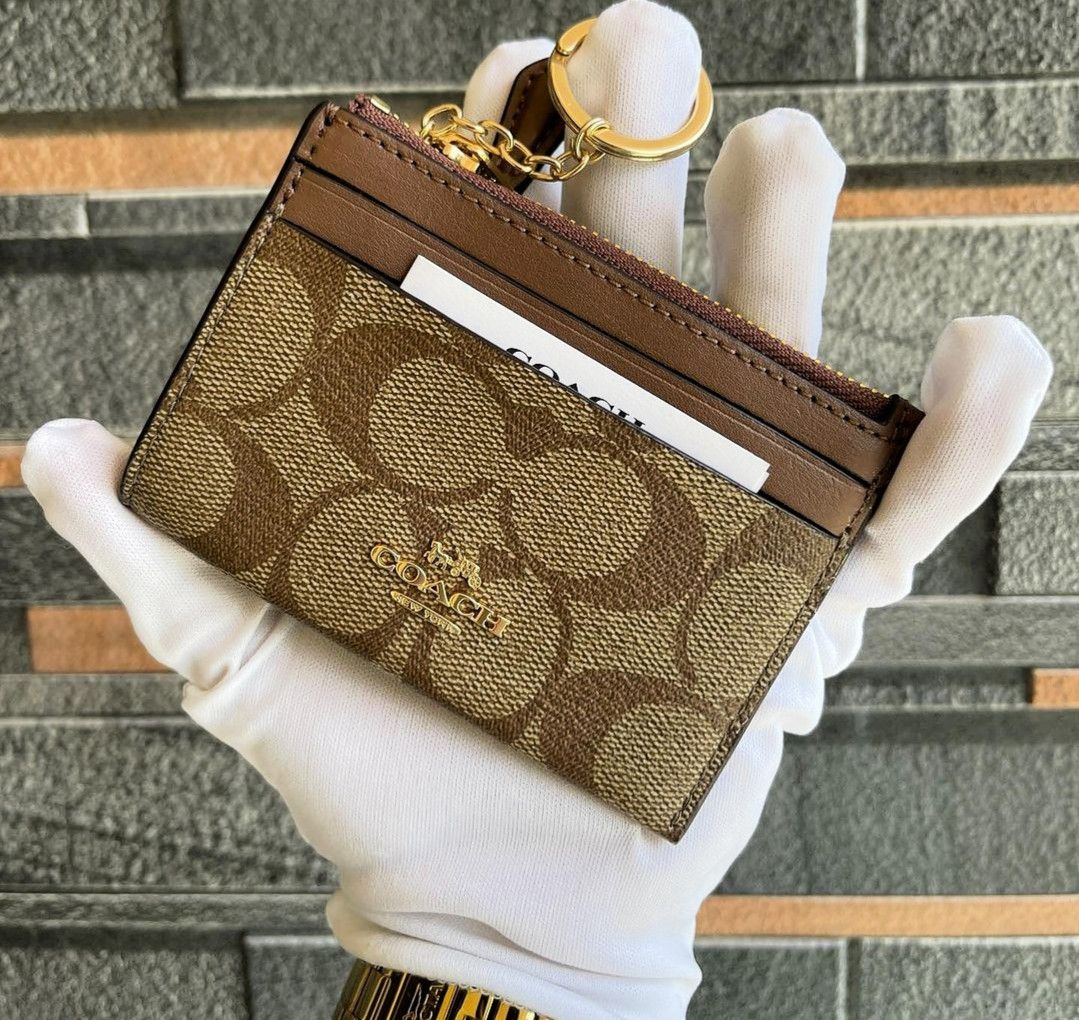 Coach Key holder, Women's Fashion, Bags & Wallets, Wallets & Card holders  on Carousell