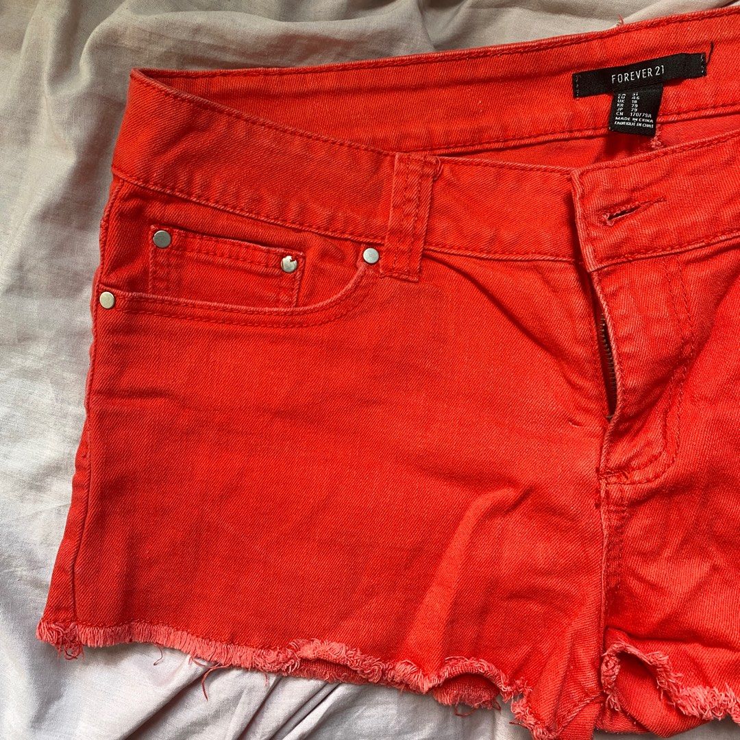 Forever21 Red Shorts Mid Rise Denim (Category: Shorts) located in Quezon City. Submitted by nikkadg (Listing ID 1251306455, Image 3). Description: Forever21 Red Shorts Mid Rise US 31 on tag Waist 35” Hips 38” Length 10”.
