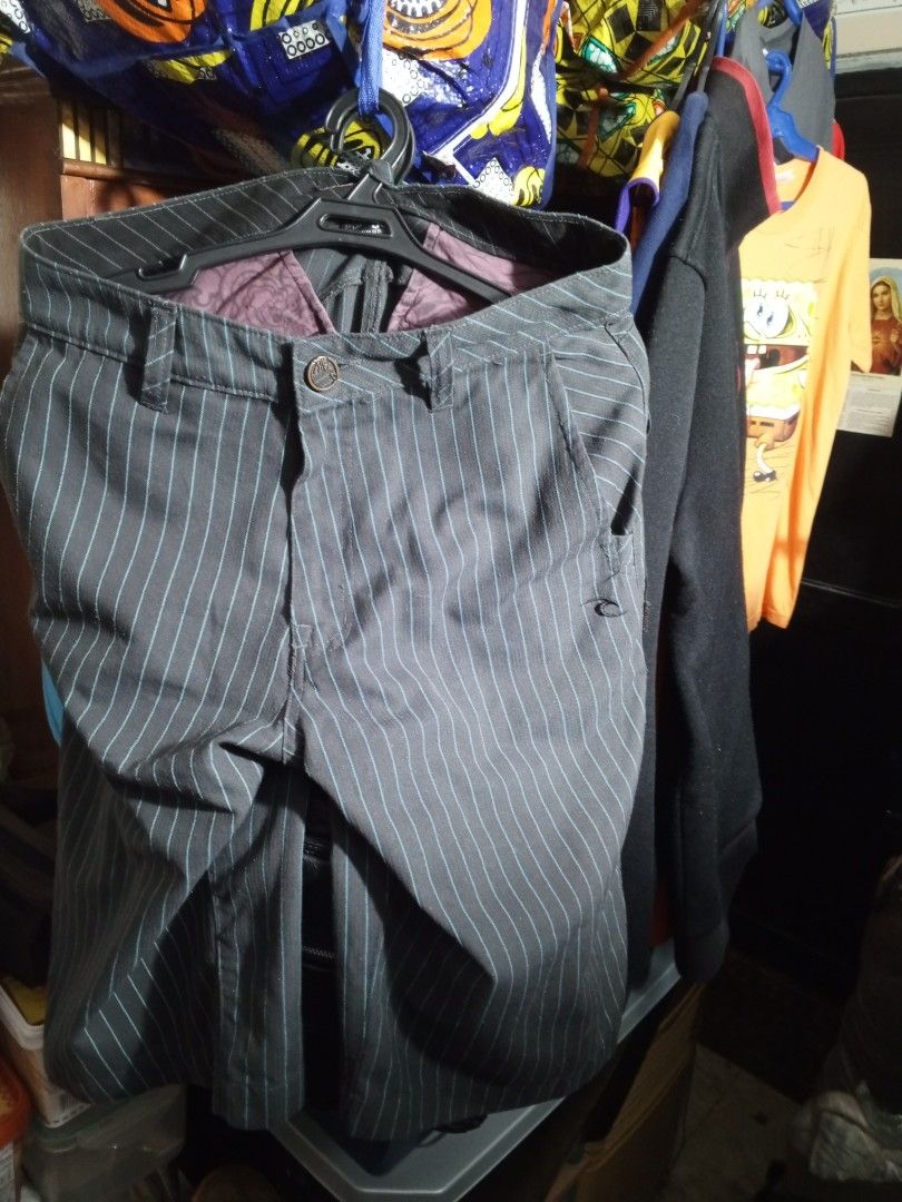 Rip Curl shorts/jorts (Category: Shorts) located in Manila. Submitted by mysteriousjohnny (Listing ID 1251461825, Image 1). Description: rip curl shorts/jorts condition 9/10 colorway gray with cyan green vertical lines size 32 inches width length 22 inches inseam 10 inches price 800php shipping fee to be shouldered by the buyer!.