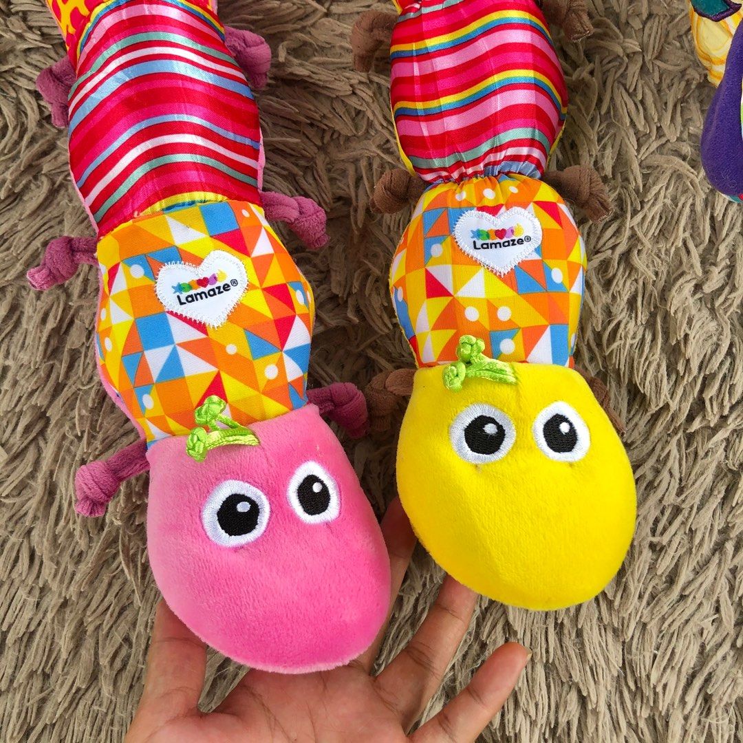 Tomy Lamaze Toys bundle (Category: Infant Playtime) located in Cabiao. Submitted by MomAndBabyCorner (Listing ID 1251288298, Image 2). Description: All in excellent condition Yellow caterillar's sound is still working PHP 750 for all ❌Cube and Yellow caterpillar sold ❌ EDIT: Pink caterpillar available (PHP250).