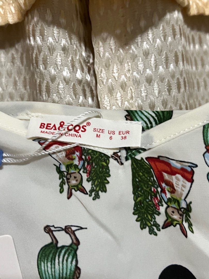 White Printed top (BKK) (Category: Blouses) located in Makati City. Submitted by sam_265 (Listing ID 1251396100, Image 3). Description: Brand new. Never used with tag pa. RFS: too big for me. .