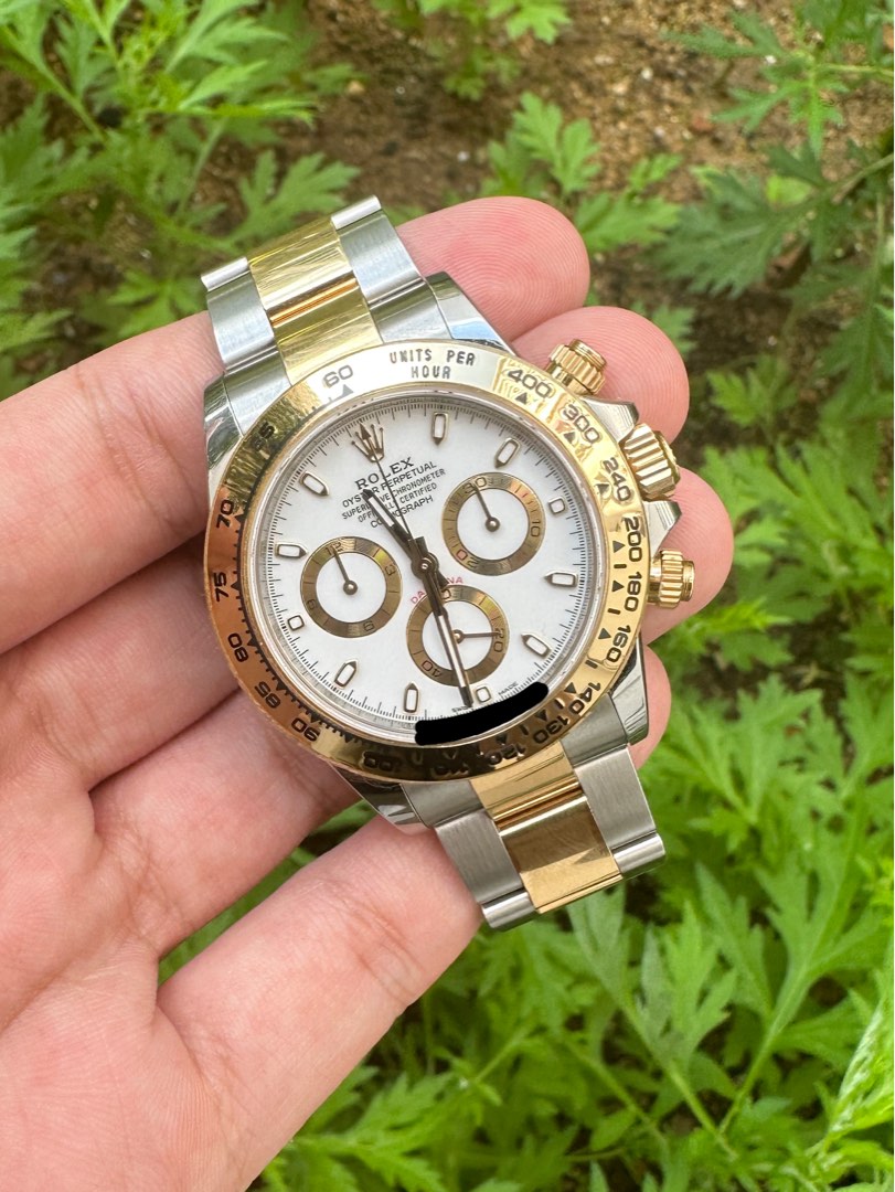 December 2021 Rolex Daytona 116503 half gold white dial face