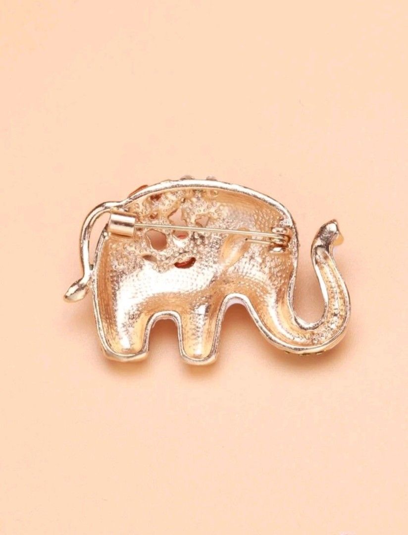 Gold hot sale elephant brooch