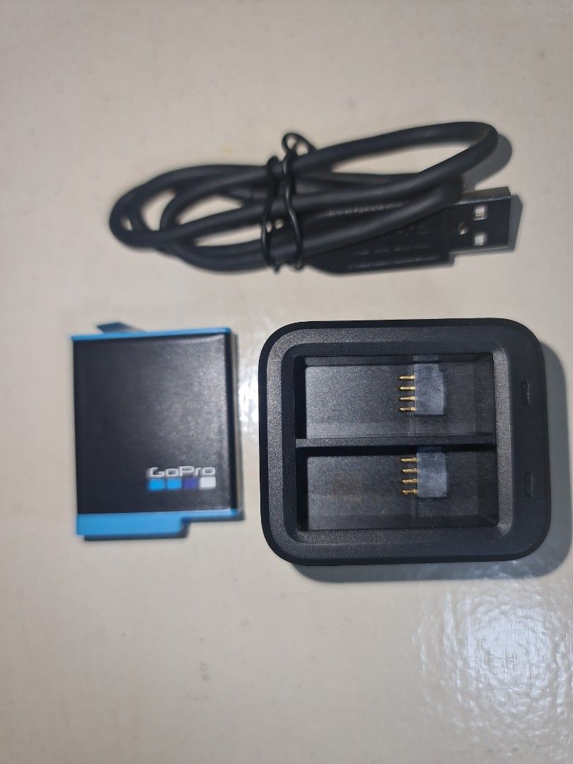 GoPro dual charger + battery (Category: Chargers) located in Makati City. Submitted by harvesting_game (Listing ID 1251653687, Image 1). Description: GoPro dual charger + 1 battery pack. Used this for GoPro 10. Only used twice in our outings. Great to have as 2 battery packs may be charged at the same time using one charger. Perfect for your spare battery. Very useful and handy to prevent low battery instances. enjoy!.