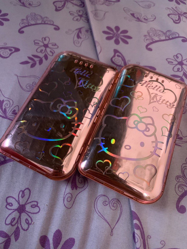 Hello kitty power bank 9800 mAh (Bundle) on Carousell