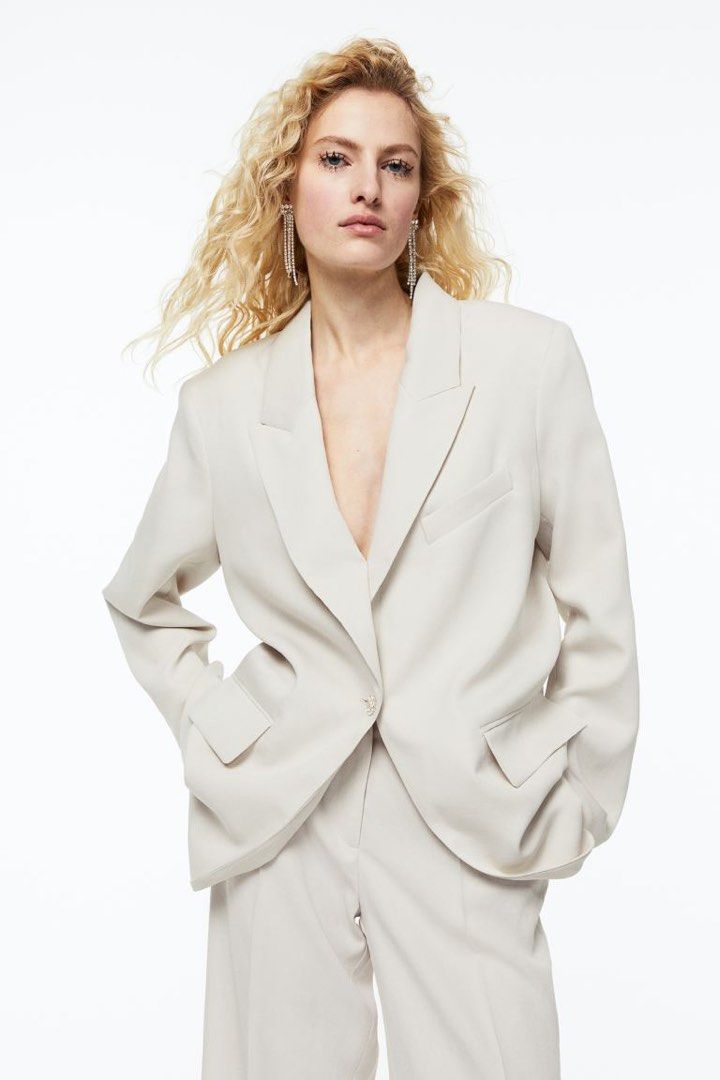 H&M Light Beige Blazer (Category: Coats, Jackets and Outerwear) located in Manila. Submitted by amiax (Listing ID 1251602677, Image 3). Description: H&M Light Beige Blazer with Rhinestone button Size: Medium (oversized) Used once only! Needs ironing With lining inside (Not available in stores) Bought for 2,300 PHP Really pretty and good materials! Not itchy on the skin 77% viscose material Manila/Pasig area.