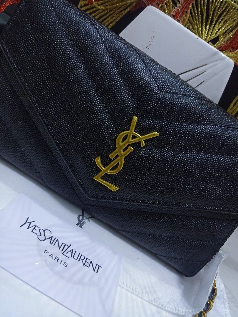 Japan Preloved Ysl Sling Wallet (Category: Luxury Bags & Wallets) located in Cebu City. Submitted by day.98 (Listing ID 1251543745, Image 2). Description: selected from japan surplus caviar leather genuine leather coded& etikita no flaws with box & dust bag.