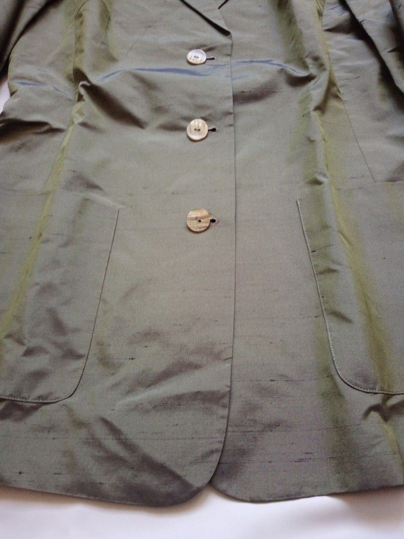 Light Jacket - Fully lined (Category: Coats, Jackets and Outerwear) located in Kuala Lumpur. Submitted by nora1960 (Listing ID 1251519136, Image 3). Description: Brand New Light jacket Full lining High quality tailoring Material : Silk Color : Olive Green Size : UK 12 Europe : 42.
