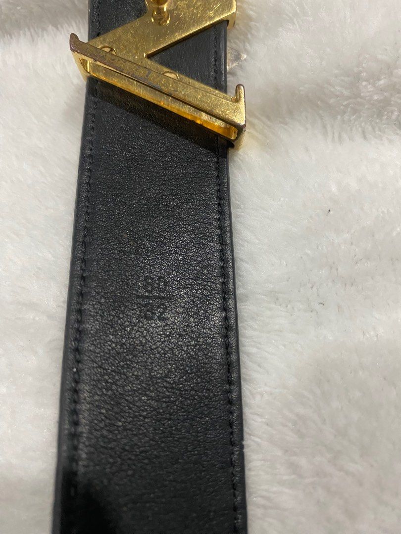 LOUIS VUITTON. Black epi leather belt, LV buckle in silv…