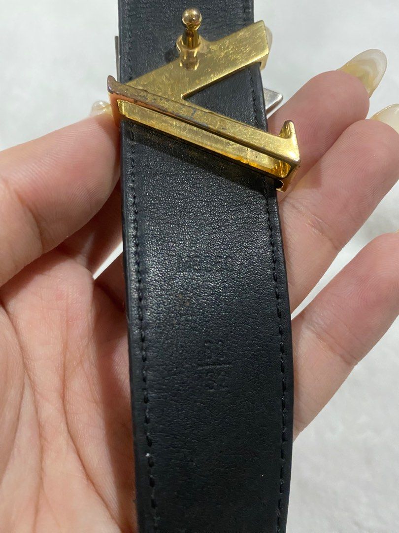 LOUIS VUITTON. Black epi leather belt, LV buckle in silv…