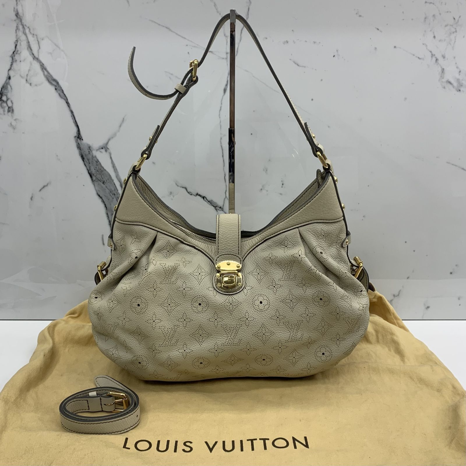 Louis Vuitton XS Crossbody Bag Mahina Leather at 1stDibs  louis vuitton  crossbody beige, louis vuitton mahina xs, louis vuitton purse cream color
