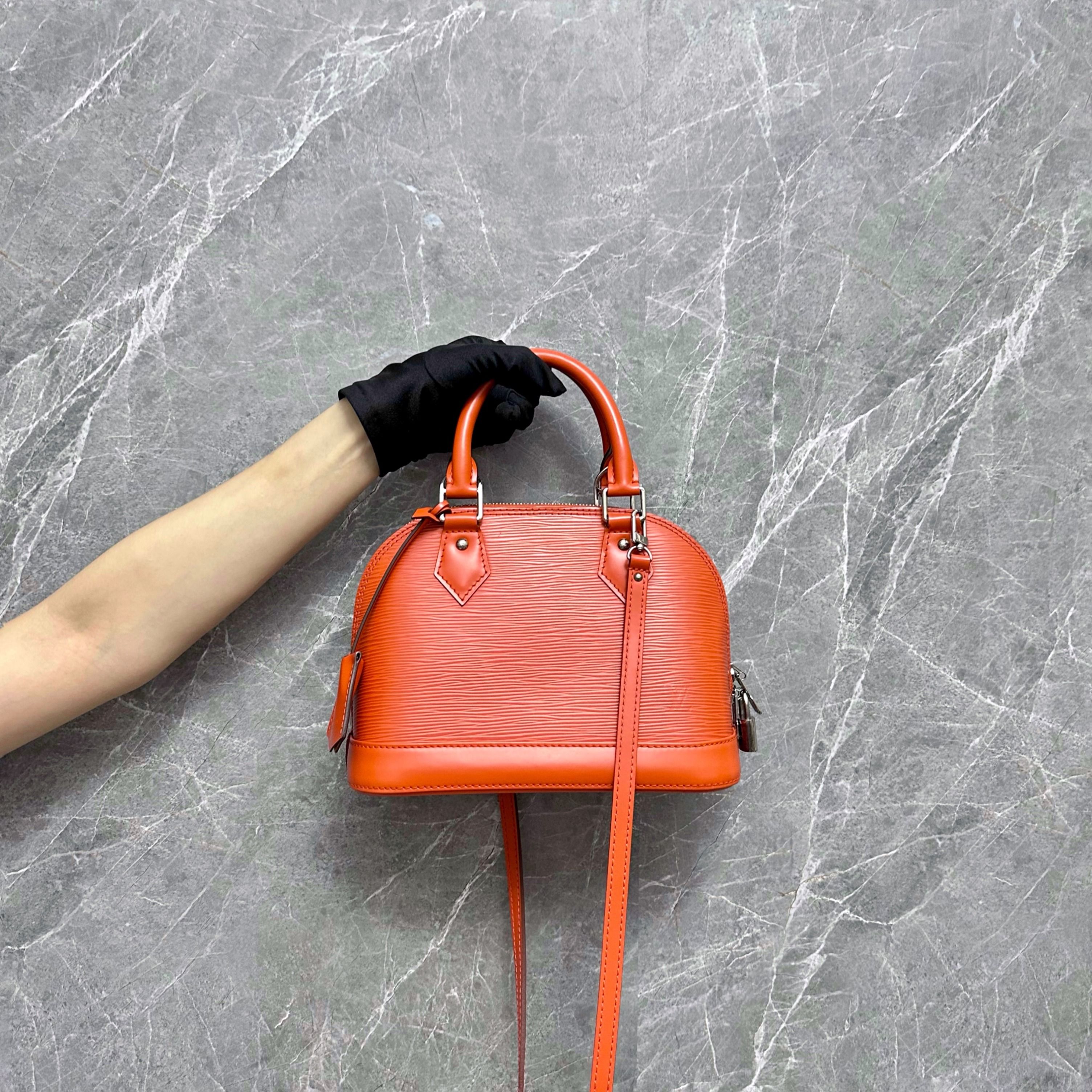 Louis vuitton alma bb orange top