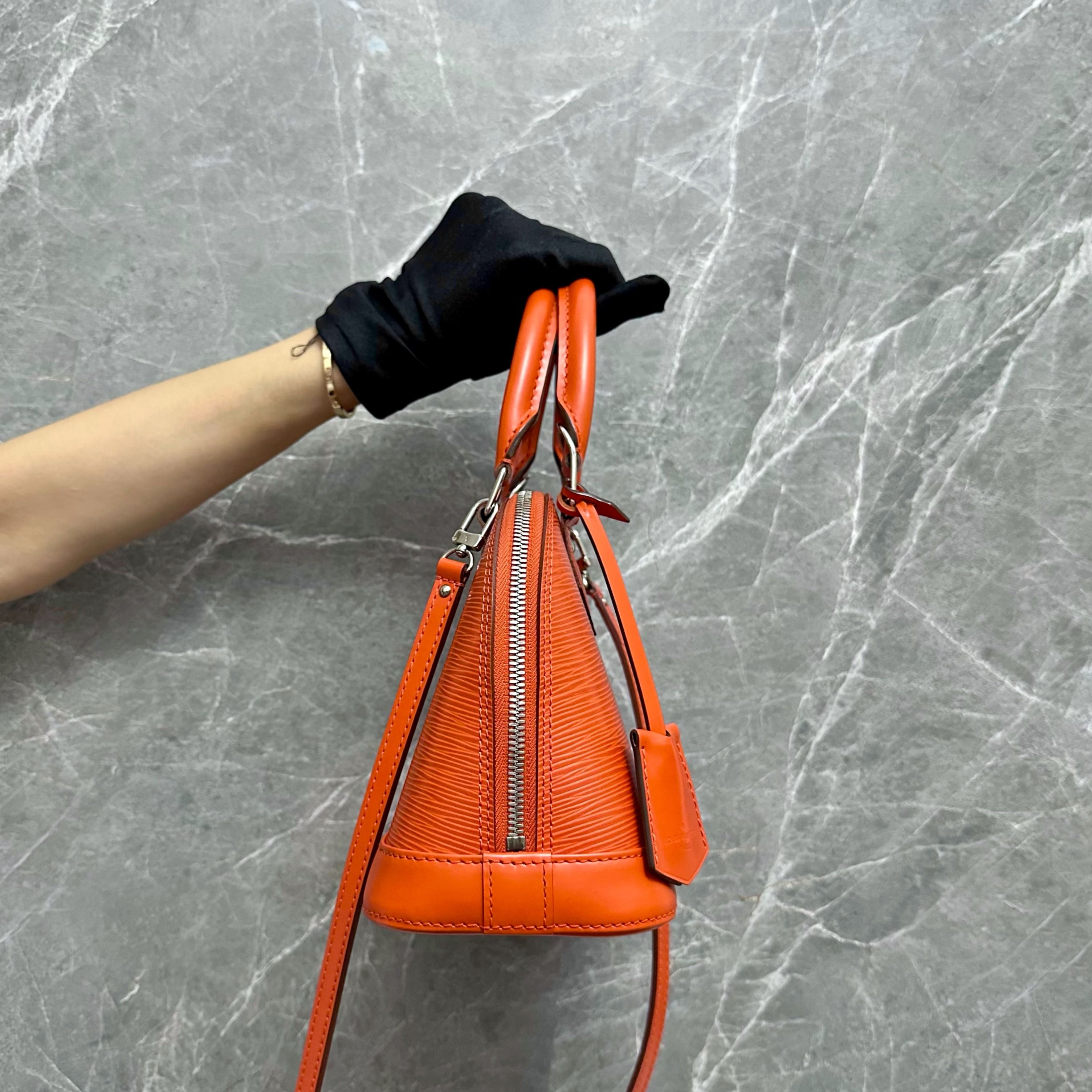 Alma BB bag in orange epi leather