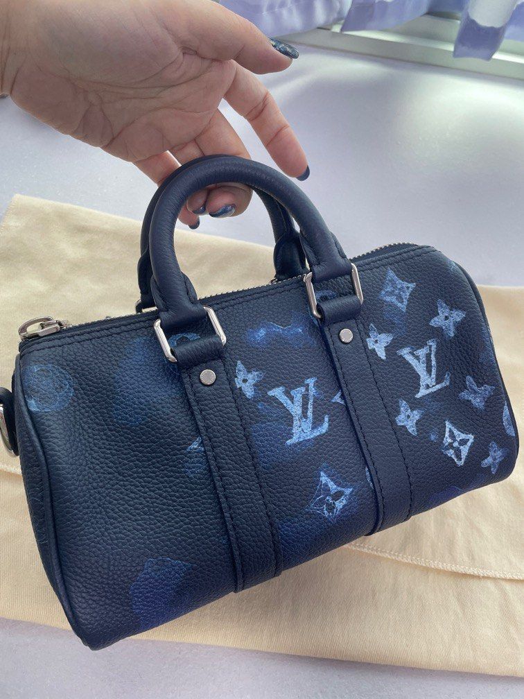 Keepall xs leather bag Louis Vuitton Navy in Leather - 20400493
