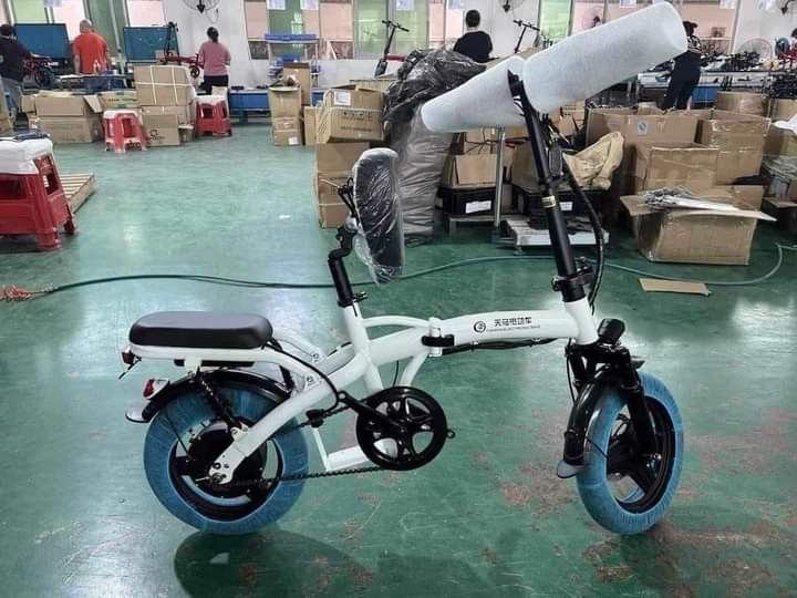 Foldable E-bike (Category: Bicycles) located in Manila. Submitted by tindahanniatelizcehl (Listing ID 1251649581, Image 1). Description: FREE ASSEMBLE FREE HELMET WITH CERTIFICATE OF OWNERSHIP SPECS: Battery: 48V15ah (Lithium ion) Motor: 350 watts Speed: 25-30 kph Range: 35 km *Keyless *Removable Battery *with pedal assist *head light *Horn *Cp holder with usb port *Tail light *Tubeless Tire (14x2.50) *Battery Gauge 7 DAYS FREE SERVICE WARRANTY (
